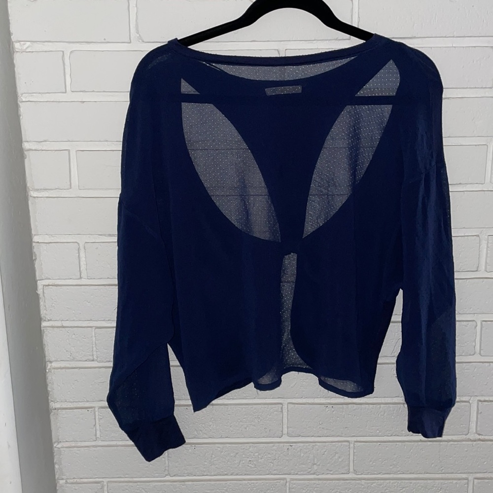 Sheer intricate backside top from Nine bird.